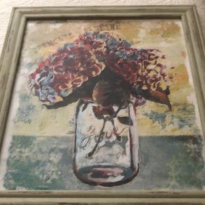 Pucture of flowers in mason jar